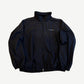 Acne Studios vintage navy nylon track jacket with washed white chest logo, stand collar and full zip front