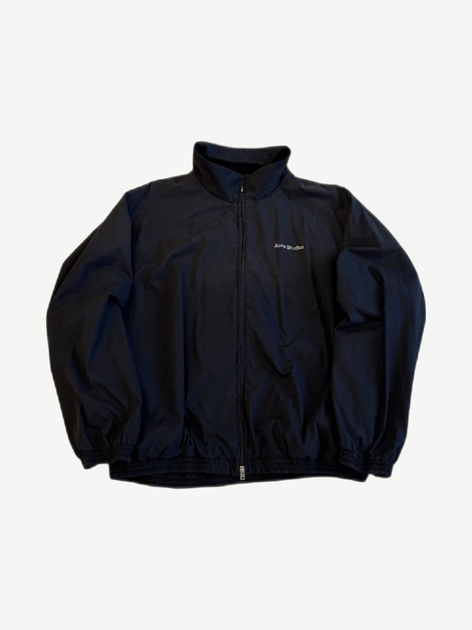 Acne Studios vintage navy nylon track jacket with washed white chest logo, stand collar and full zip front