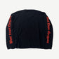 Back of West Coast Choppers black thermal with red gothic script running down both sleeves