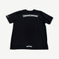 Back of Chrome Hearts black tee with large white Old English Chrome Hearts scroll print across shoulders