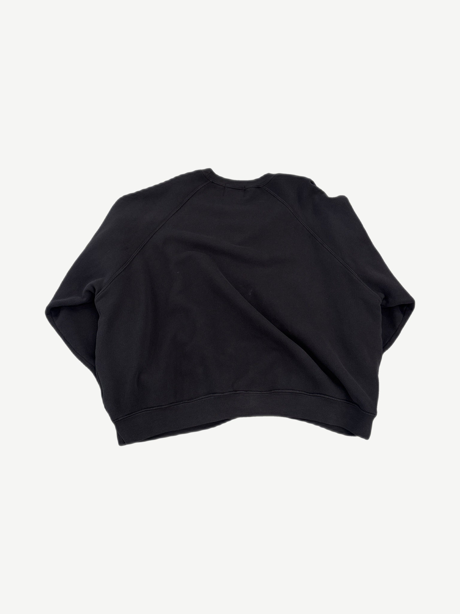Enfants Riches Deprimes Le Rosey black raglan crewneck back view with plain black body and raglan sleeves.
