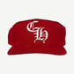 Chrome Hearts red 6 panel baseball cap with white Old English CH embroidered logo on front crown