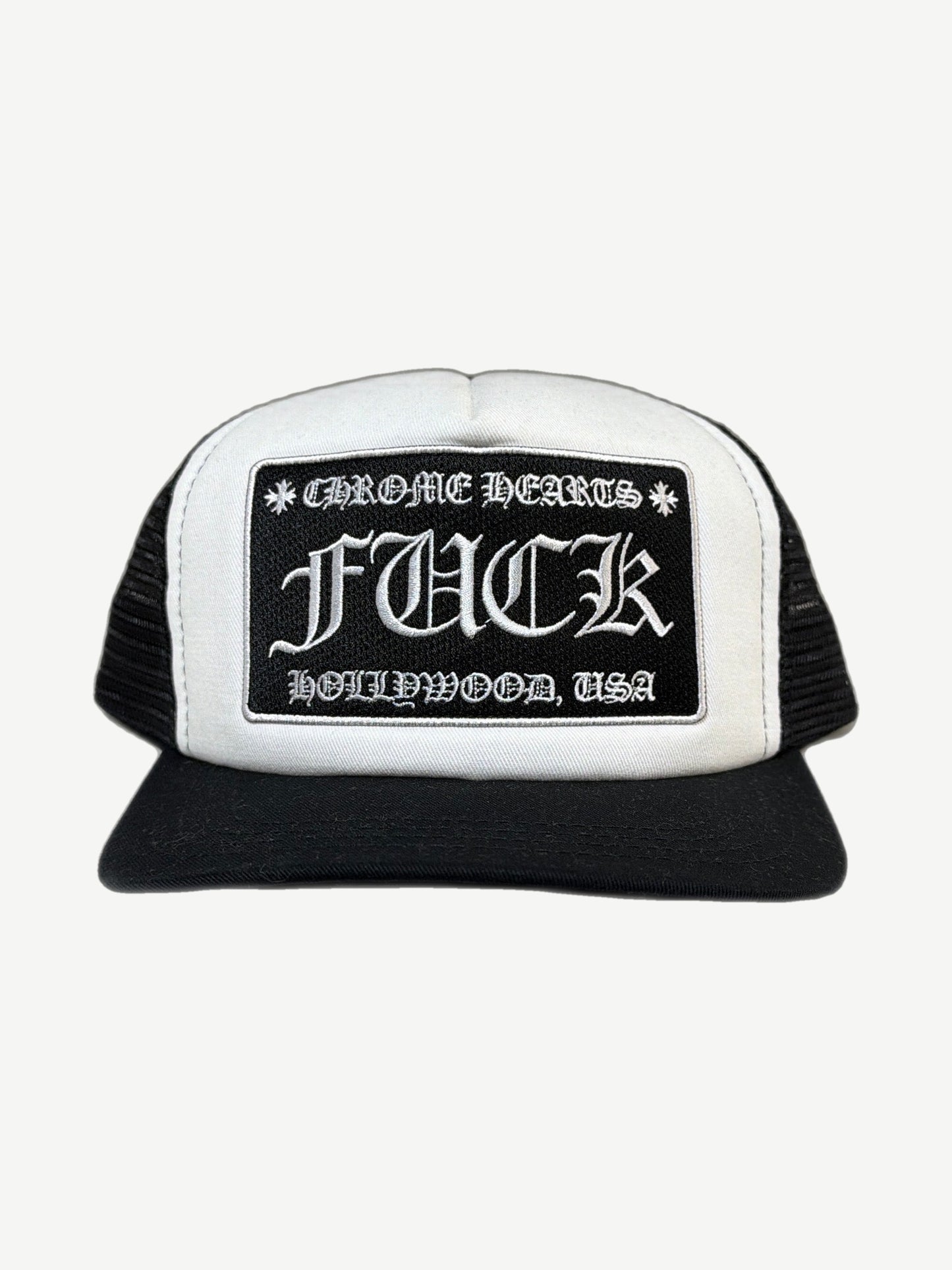 Chrome Hearts white and black trucker hat front with Fuck Hollywood USA gothic patch and black mesh sides
