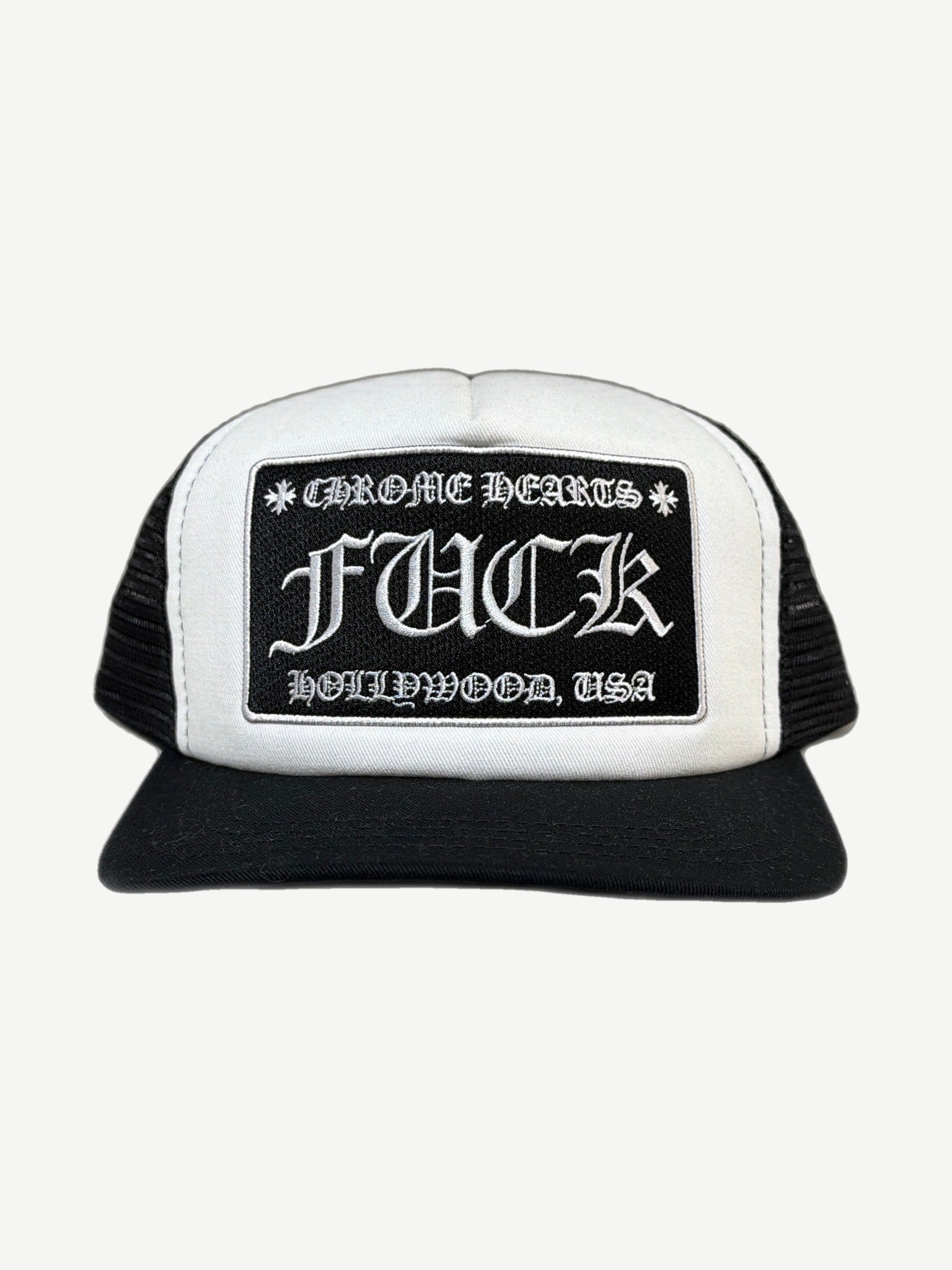 Chrome Hearts white and black trucker hat front with Fuck Hollywood USA gothic patch and black mesh sides