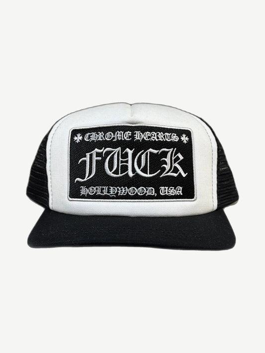 Chrome Hearts white and black trucker hat front with Fuck Hollywood USA gothic patch and black mesh sides