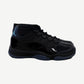 Air Jordan 11 Retro Gamma Blue 2025 sneaker side profile showing patent leather mudguard and mesh upper.