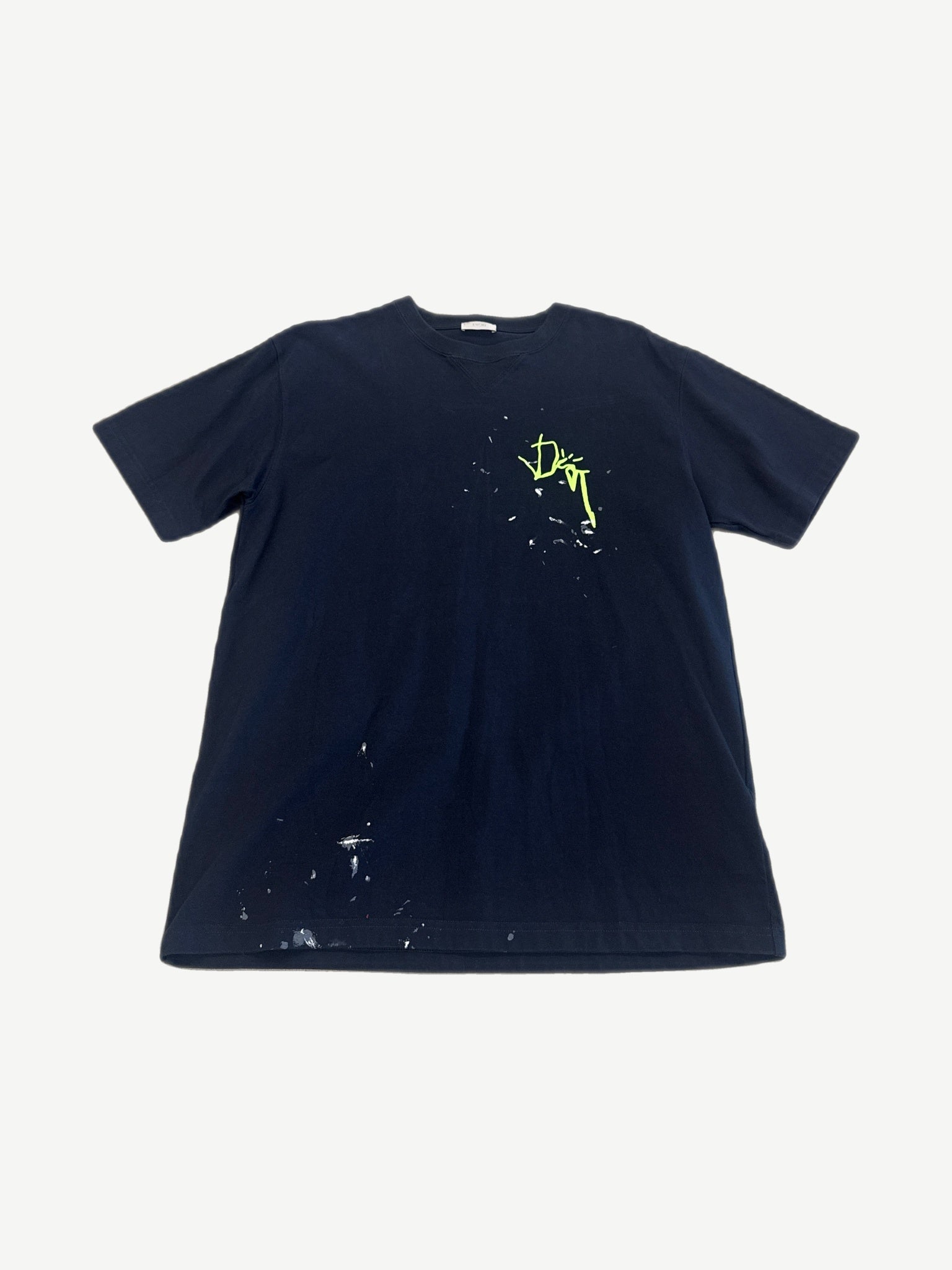 Dior x Cactus Jack navy oversized tee with neon yellow signature print and paint splatter finish