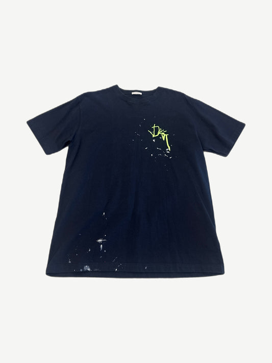 Dior x Cactus Jack navy oversized tee with neon yellow signature print and paint splatter finish