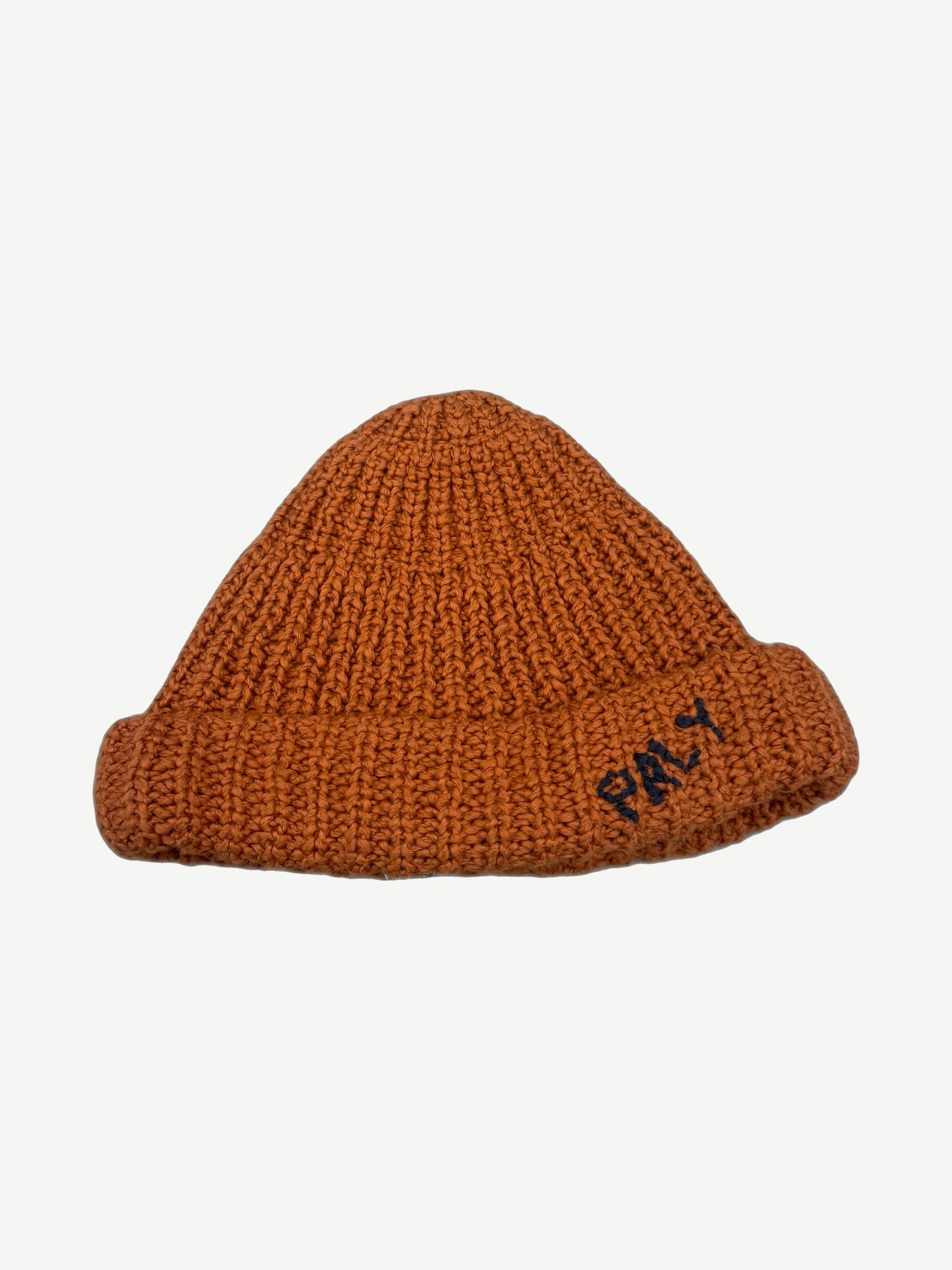 Paly Hollywood hand-knit chunky ribbed beanie in burnt orange with navy PALY logo embroidered on cuff.