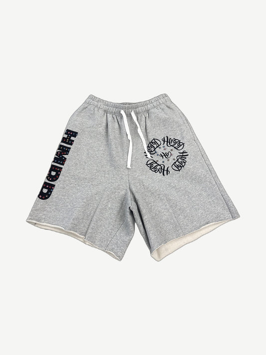 HMDD gray Chimstone sweat shorts with vertical rhinestone HMDD lettering and circular crystal logo