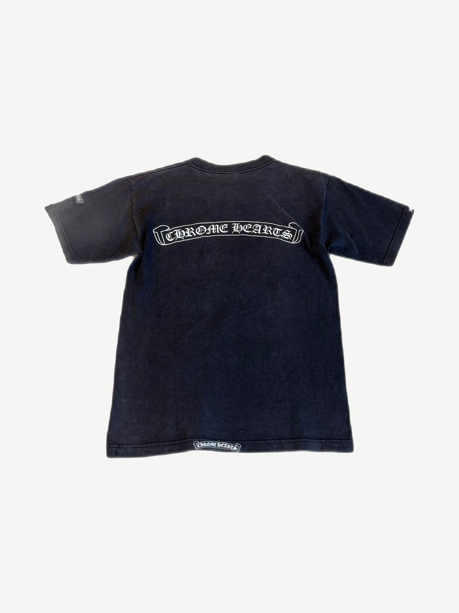 Chrome Hearts vintage navy pocket tee back view with white scroll banner gothic Chrome Hearts logo.