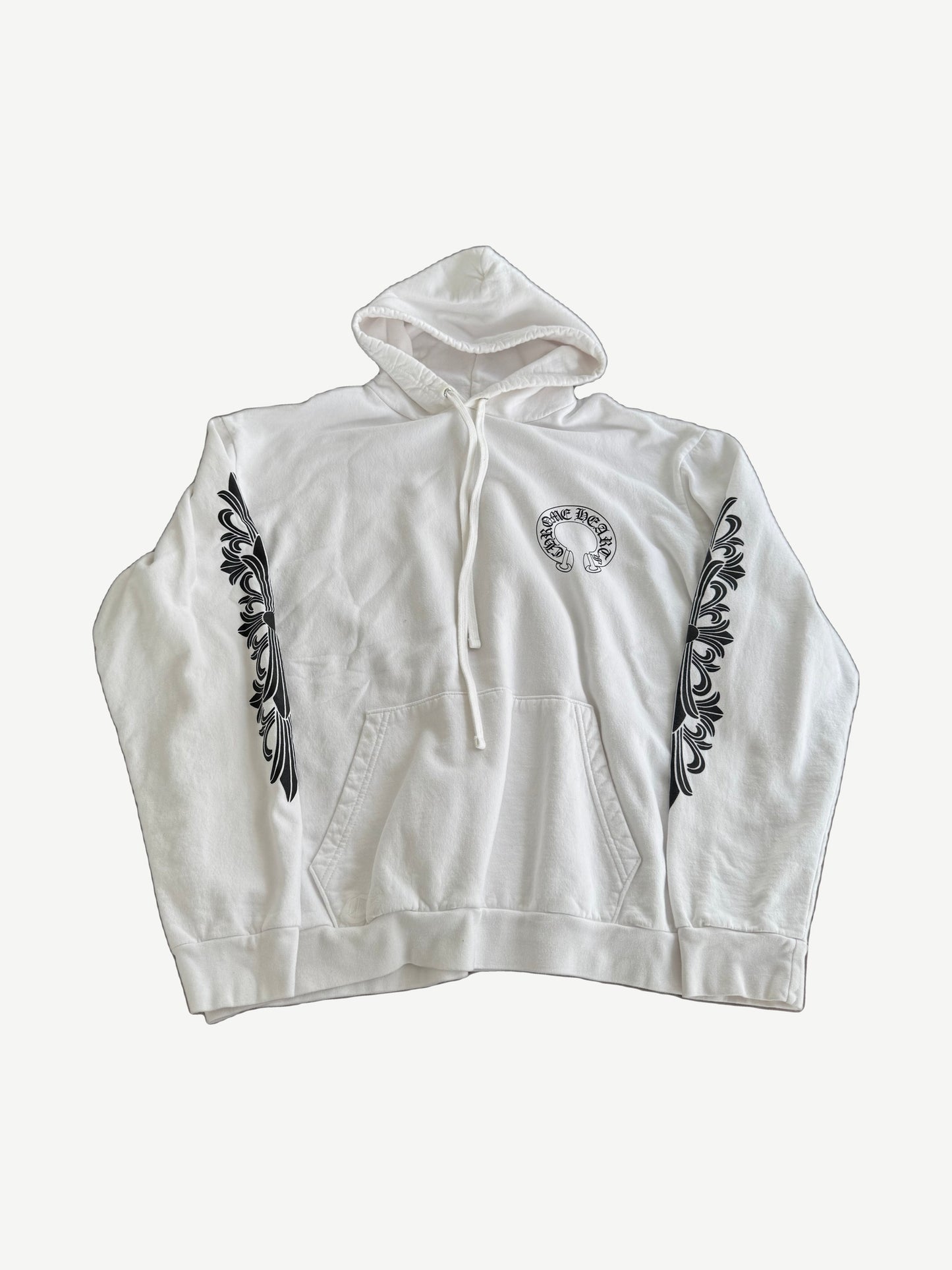 Chrome Hearts white cotton hoodie front with small horseshoe chest logo and black floral cross sleeve prints