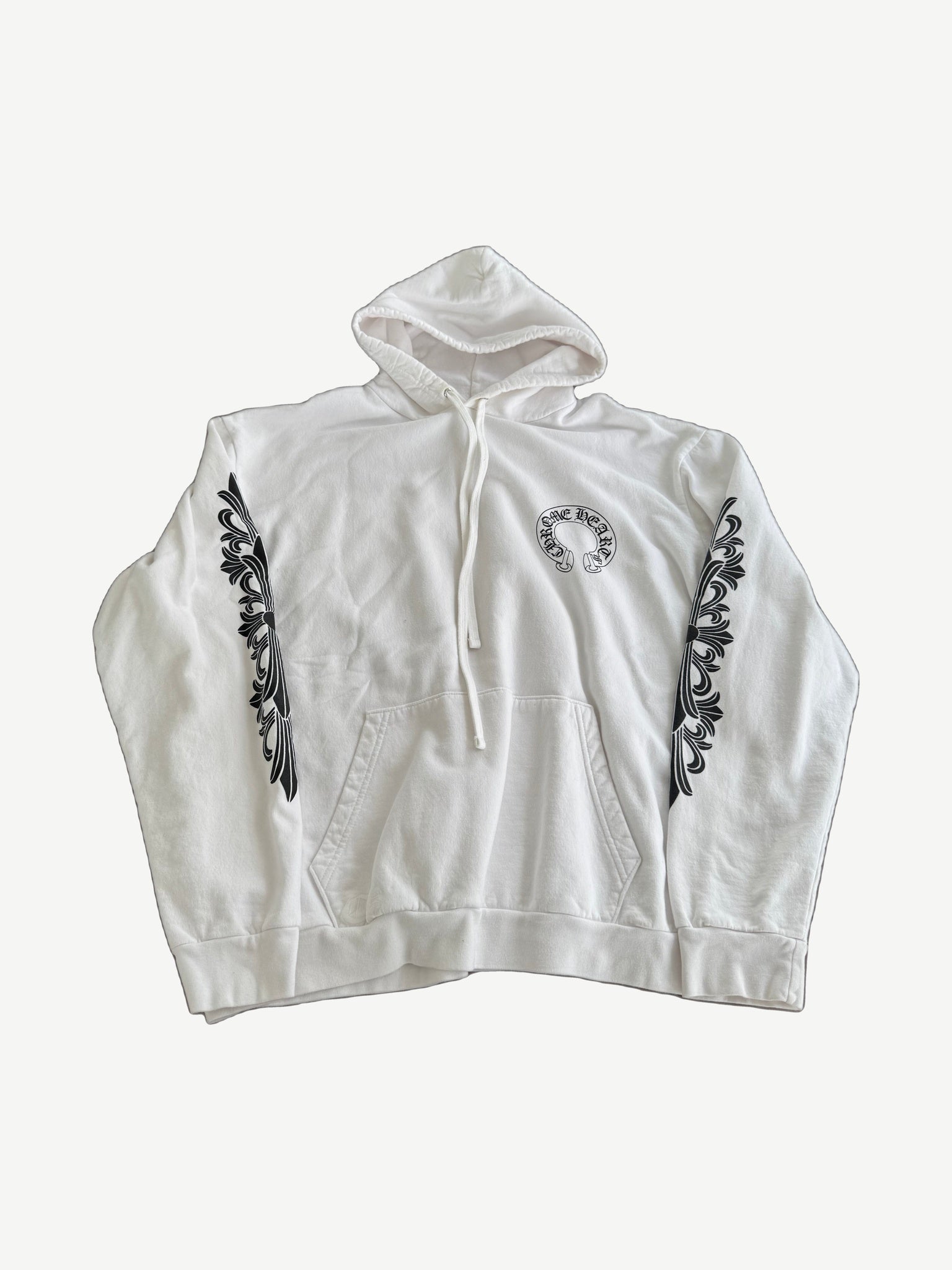Chrome Hearts white cotton hoodie front with small horseshoe chest logo and black floral cross sleeve prints