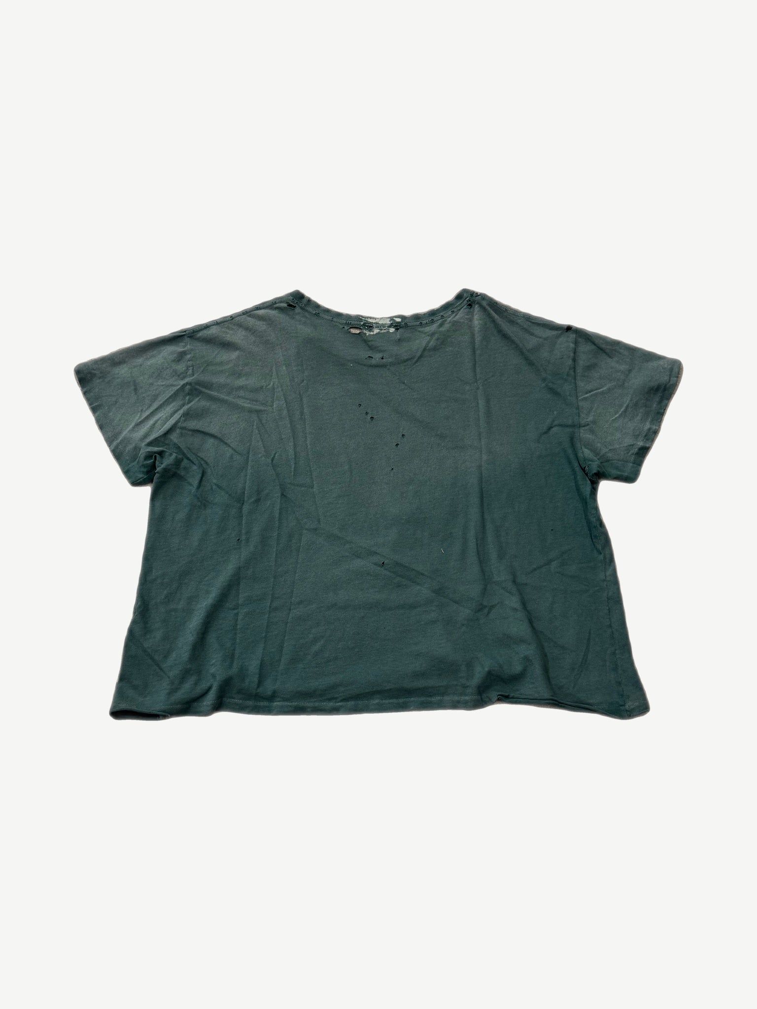 Enfants Riches Deprimes green tee back view showing distressed cotton with scattered holes