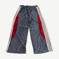 GV Gallery Raspberry Hills Tracy McGrady sweatpants, dark gray fleece with portrait graphic print on left thigh.