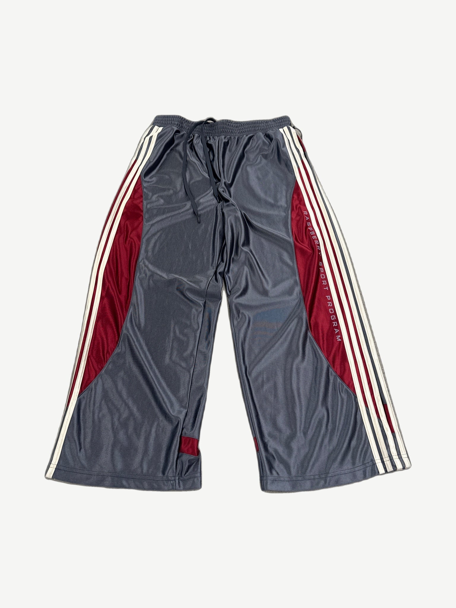 GV Gallery Raspberry Hills Tracy McGrady sweatpants, dark gray fleece with portrait graphic print on left thigh.