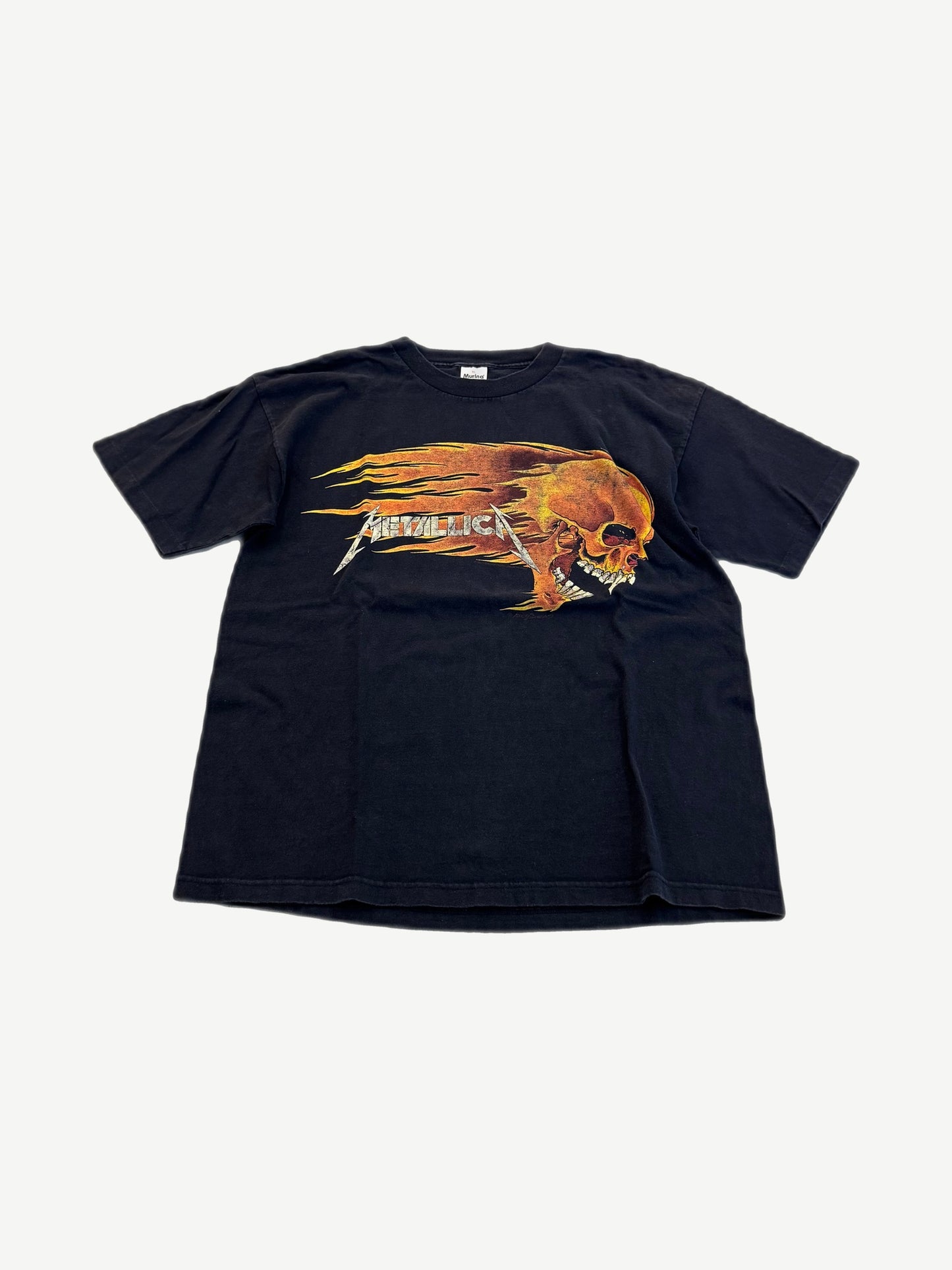 Vintage Metallica black tee front with Pushead flaming skull screaming graphic over silver band logo