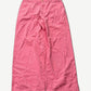 Acne Studios Tango pink corduroy wide-leg pants front view with button fly and contrast white waistband stitching