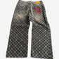 Louis Vuitton monogram denim pants back showing five-pocket styling and tonal black LV embossed jacquard