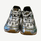 Bottega Veneta Orbit sneakers front pair view with white laces, olive panels and silver chrome toe overlays