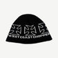 Vintage West Coast Choppers black knit beanie with white iron cross logos and brand text around cuff.