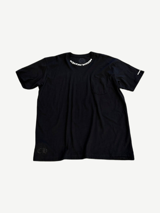 Chrome Hearts black tee front with chest pocket and small white neck stamp gothic CH logo print.