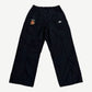 Supreme x Umbro black cotton ripstop track pants with Supreme World Famous patch and Umbro diamond logo.
