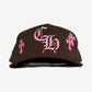 Chrome Hearts brown baseball cap front, pink leather CH cross patch sewn at crown