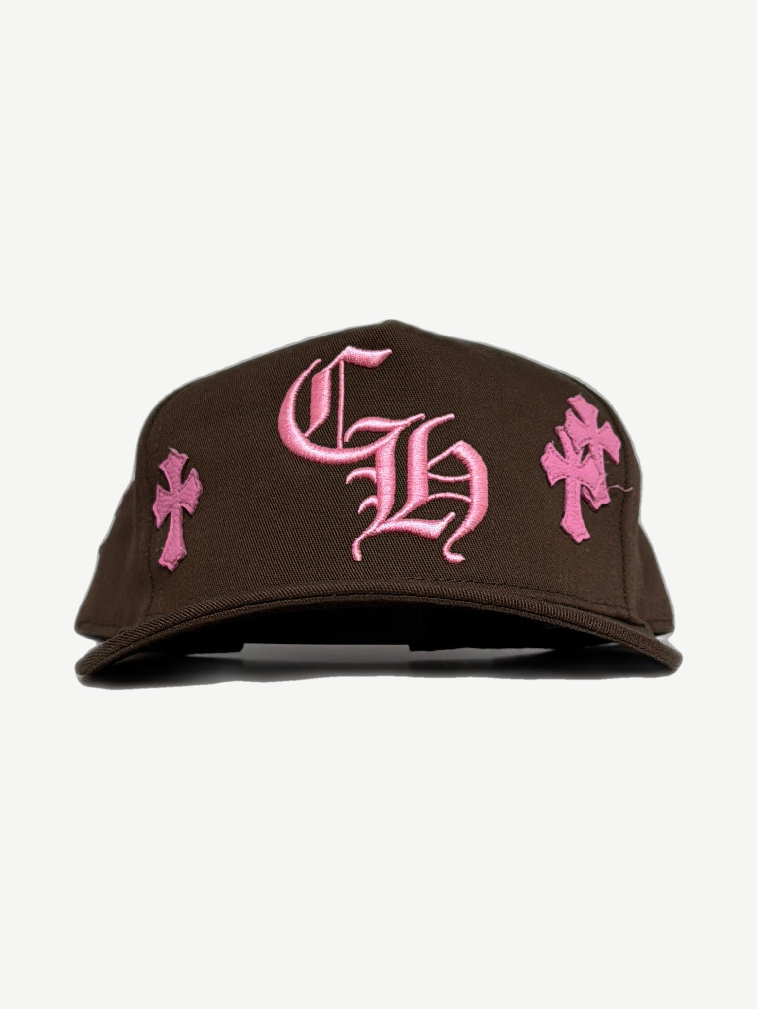 Chrome Hearts brown baseball cap front, pink leather CH cross patch sewn at crown