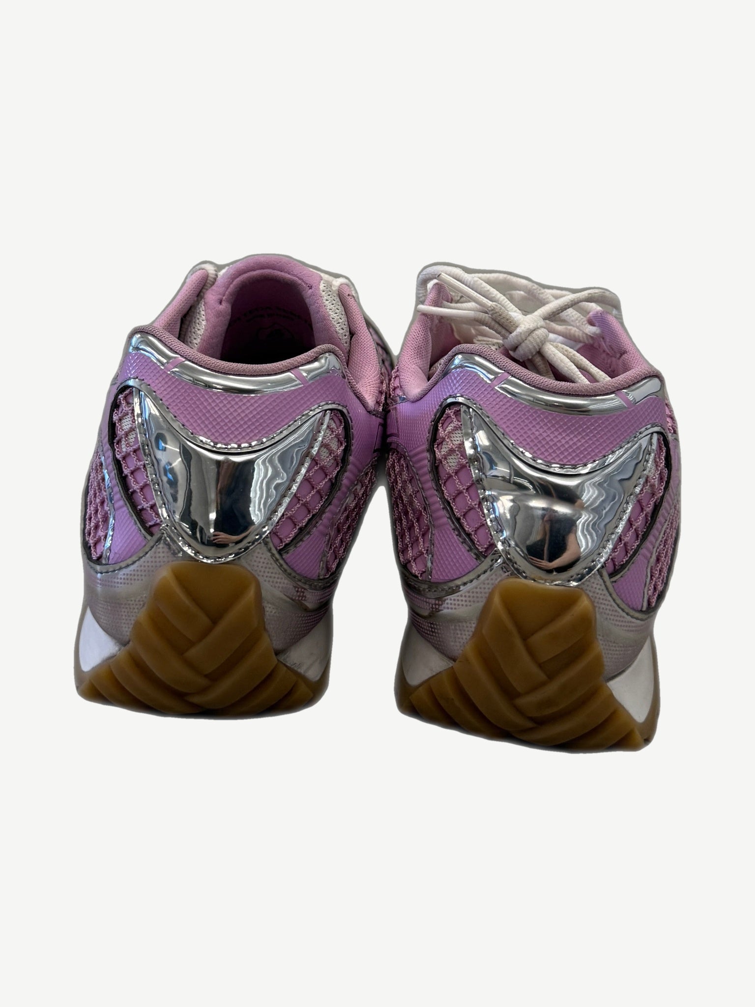 Bottega Veneta Orbit sneakers rear view with mirrored silver heel cradles and intrecciato woven gum sole