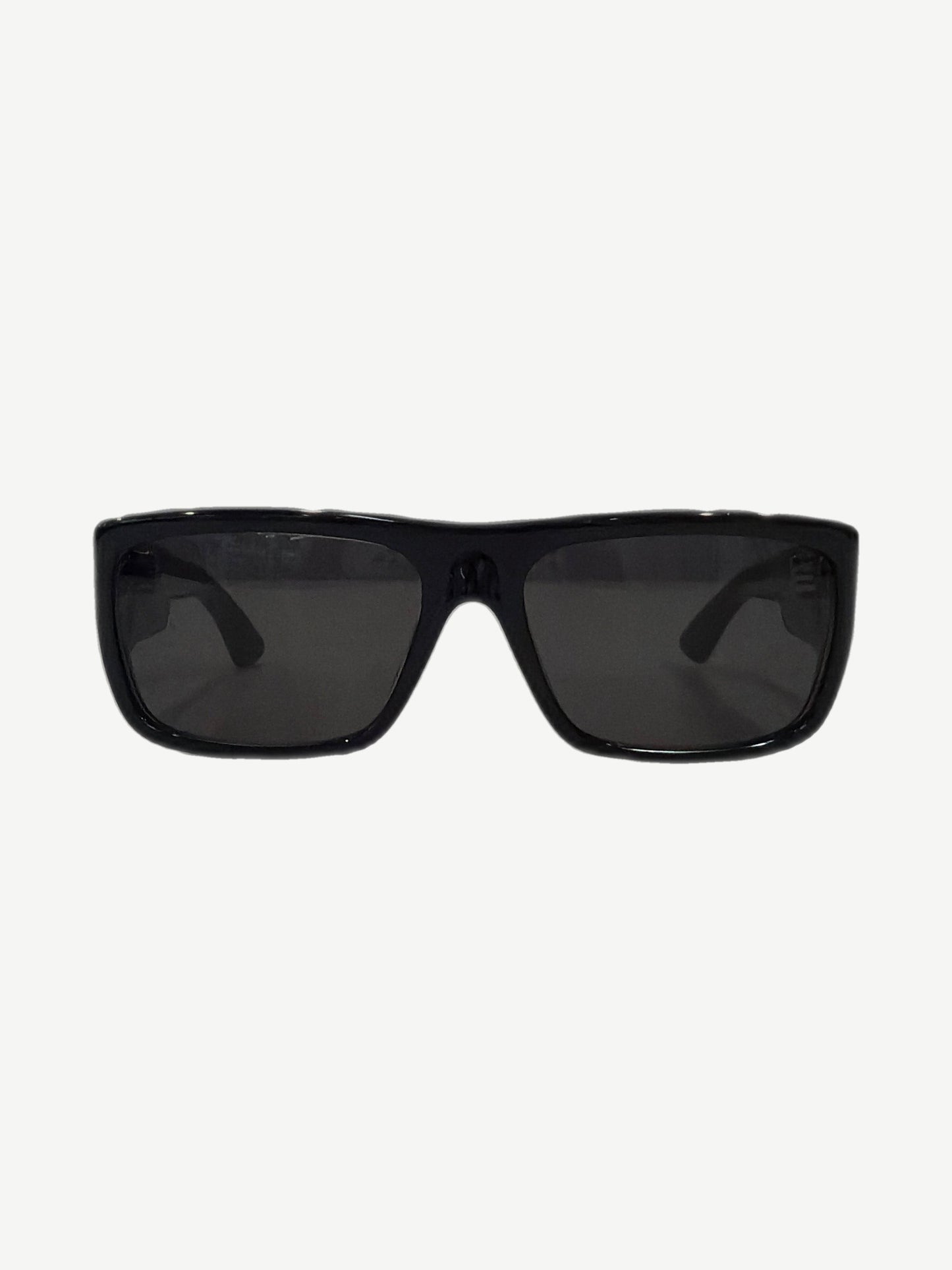 Chrome Hearts black sunglasses folded view with engraved Yer Born Again temple text and sterling silver detail.