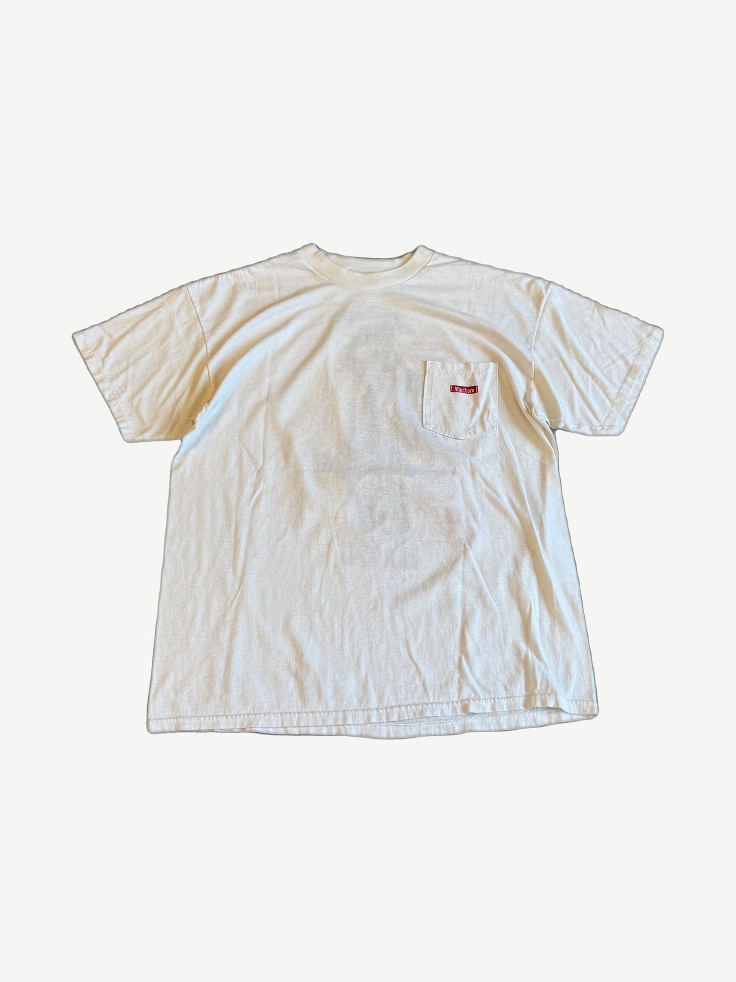 Vintage white Marlboro tee front view with chest pocket and red Marlboro label tag on the pocket