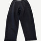 Back of Balenciaga washed black sweatpants with elastic waistband and faded sun-washed cotton fleece finish