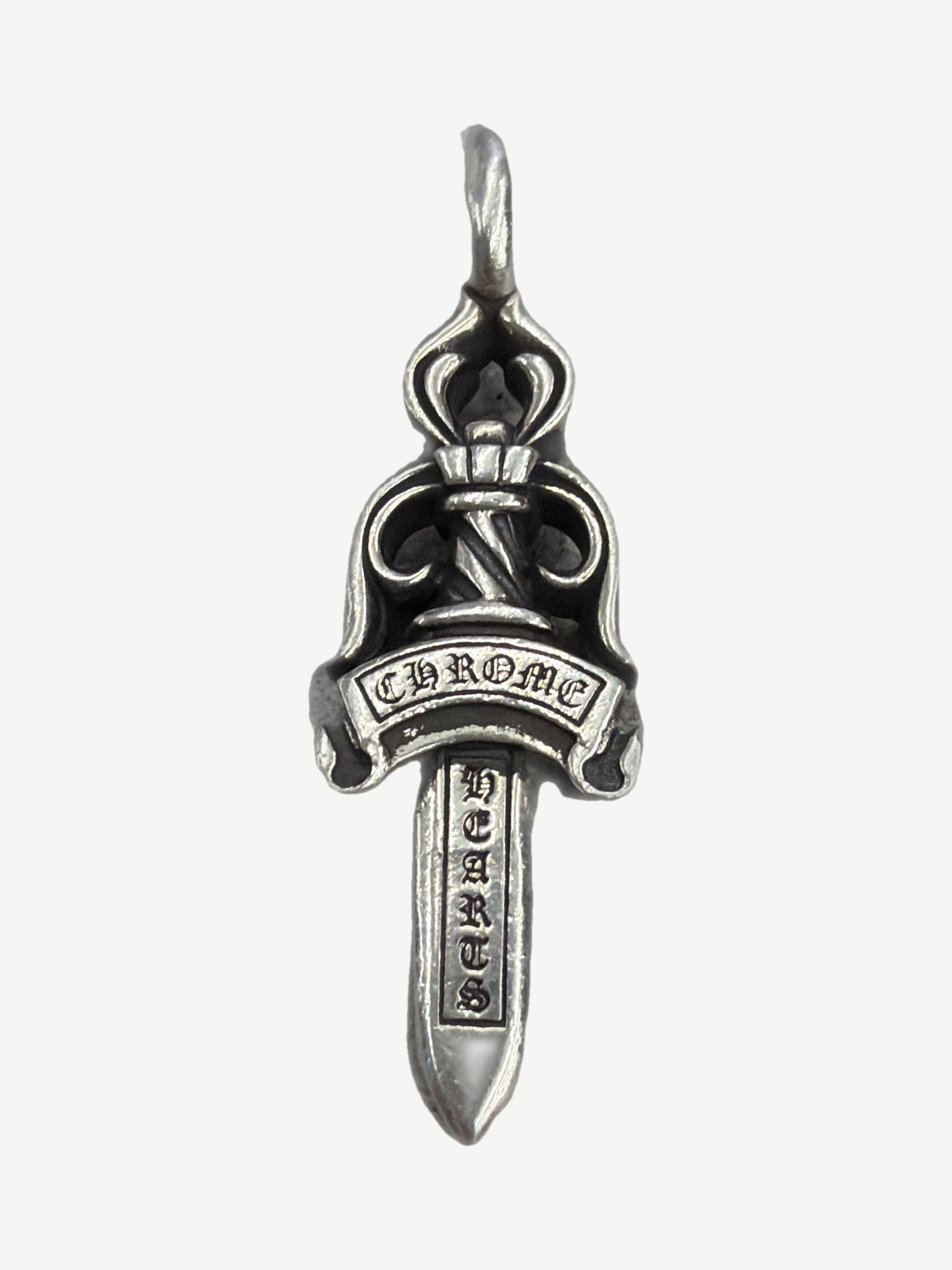 Chrome Hearts Double Dagger silver pendant with gothic Chrome Hearts banner across crossed daggers.