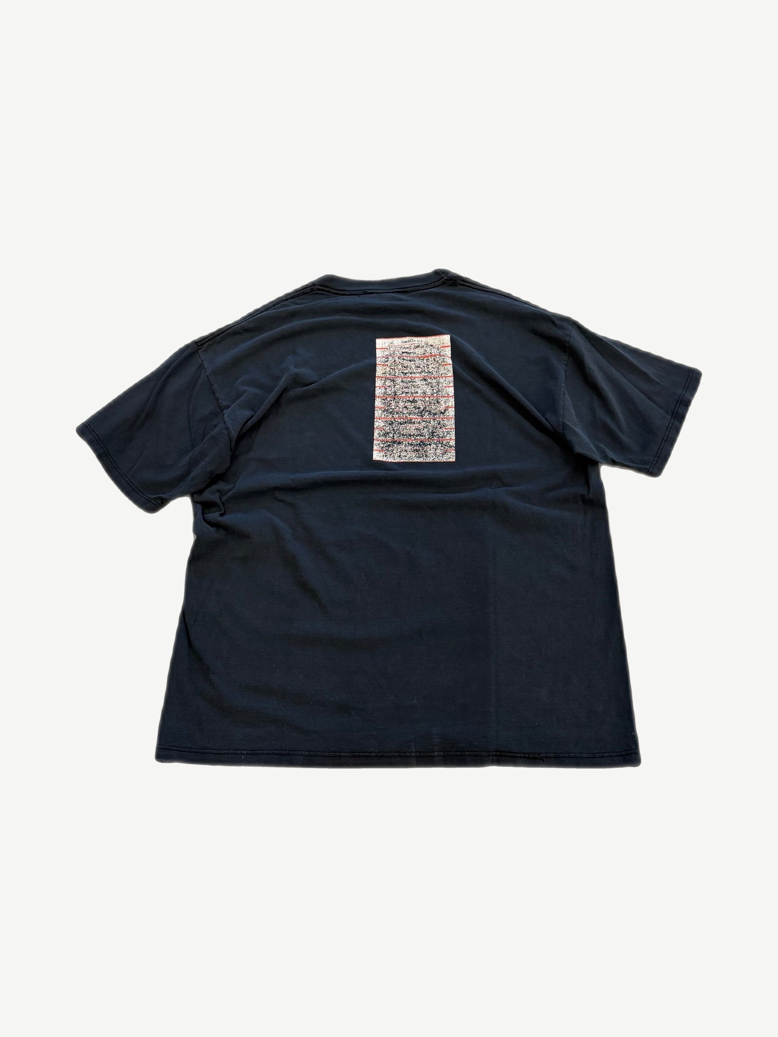 Back of vintage Pearl Jam No Code navy tee with cassette-tape style red and black tour graphic