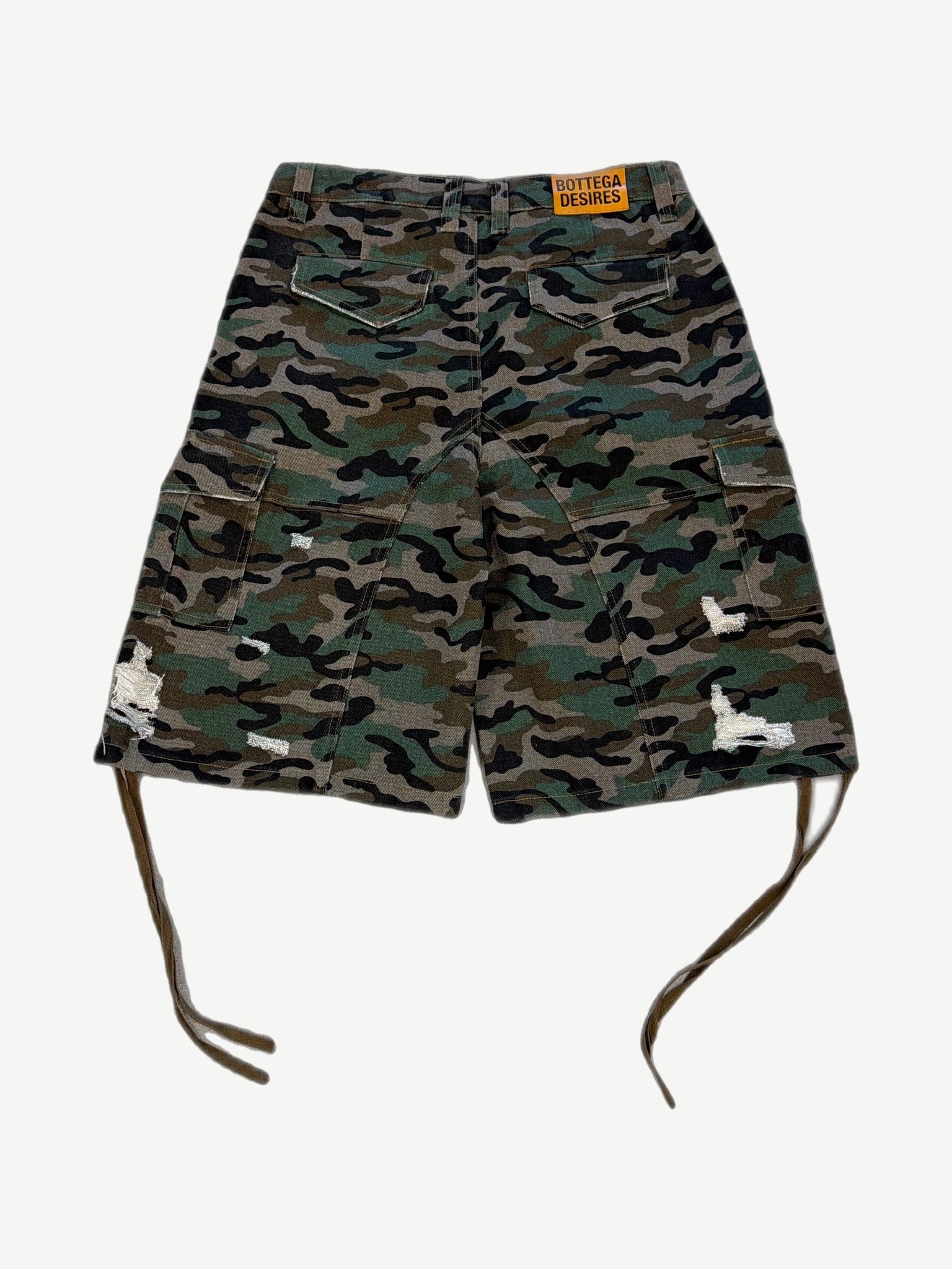 Bottega Desires camo cargo shorts back view showing rear pockets and distressed frayed cuff detail