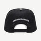 Chrome Hearts trucker hat back with adjustable mesh panel and white pony hair triple cross logo at front.
