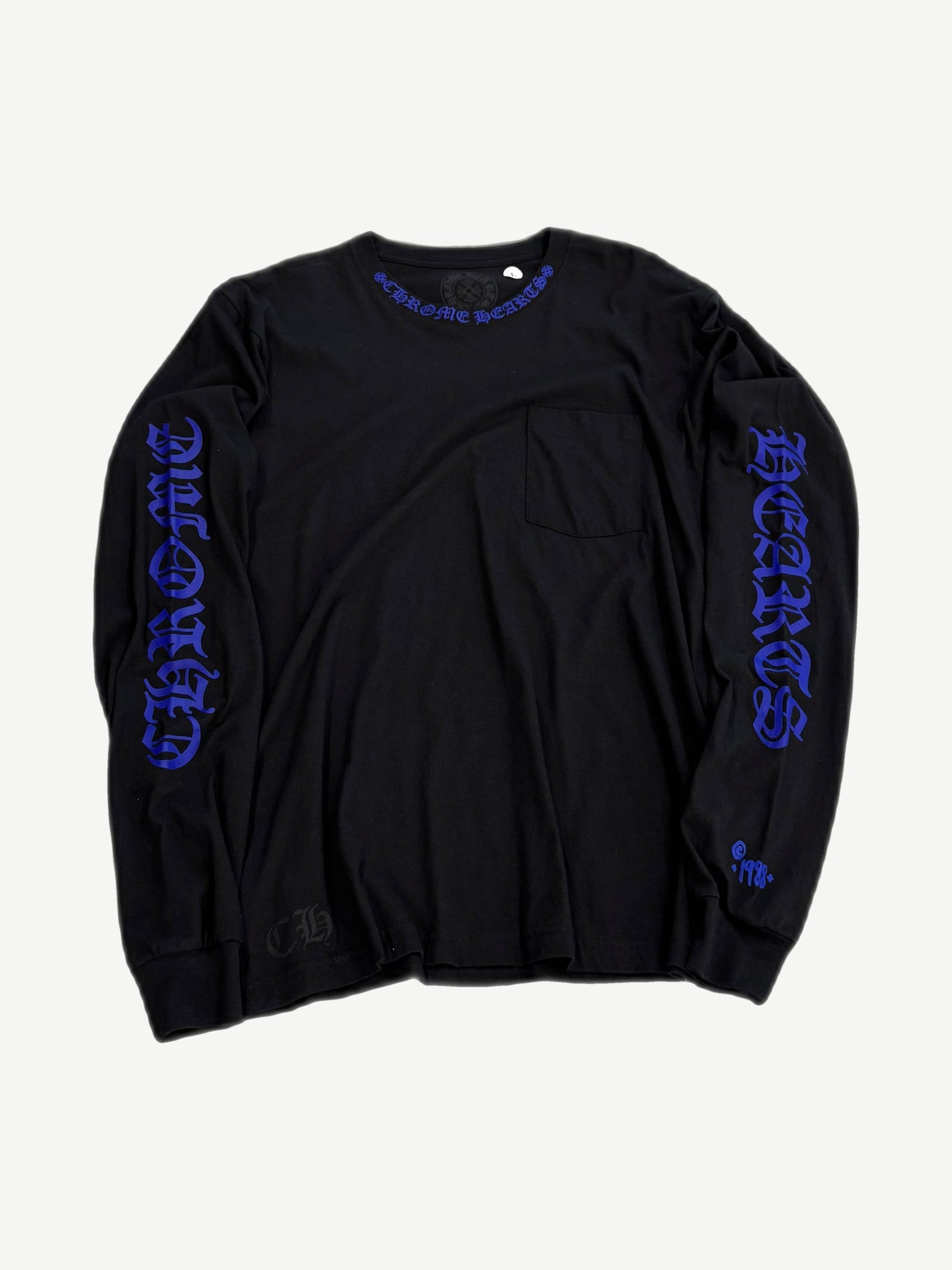 Chrome Hearts black longsleeve tee with cobalt blue gothic CHROME HEARTS print on both sleeves and neck cross logo.