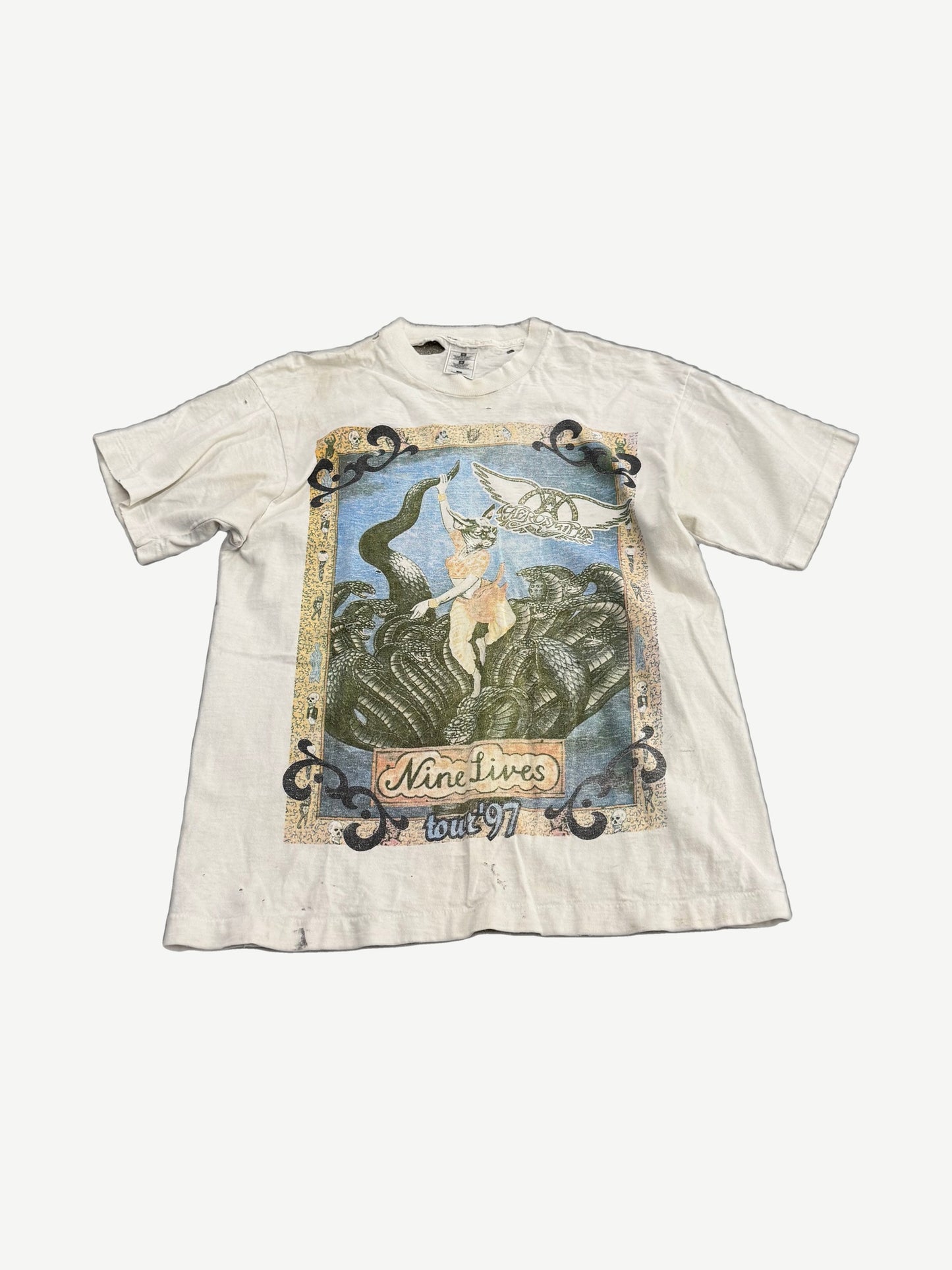 Vintage Aerosmith Nine Lives tour tee in black with cat graphic and tour artwork printed on front.