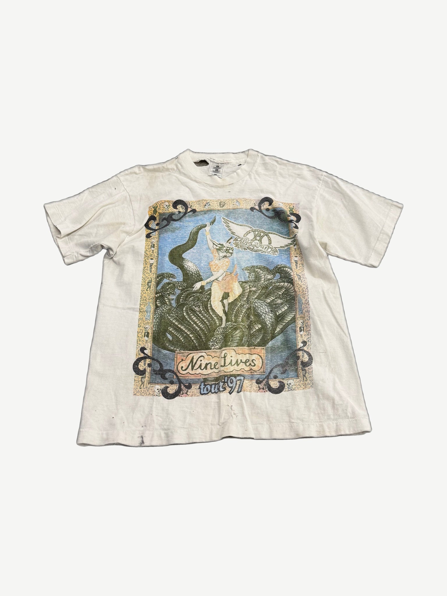 Vintage Aerosmith Nine Lives tour tee in black with cat graphic and tour artwork printed on front.