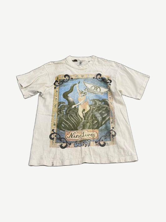 Vintage Aerosmith Nine Lives tour tee in black with cat graphic and tour artwork printed on front.