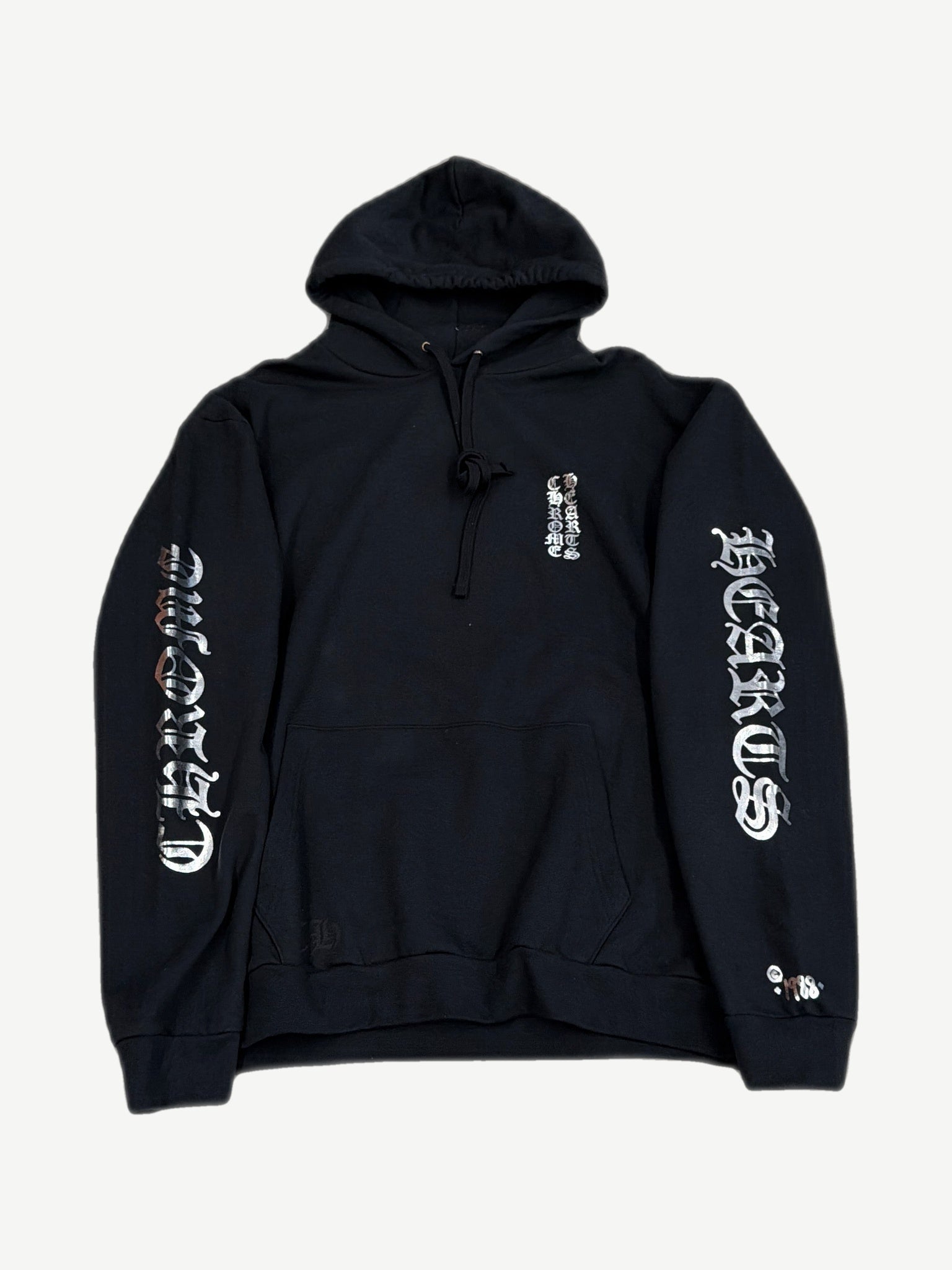 Chrome Hearts black pullover hoodie with metallic silver gothic Chrome Hearts logos down both sleeves