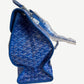 Goyard Saint Leger backpack side profile in blue chevron canvas with structured gusset and Goyard signature