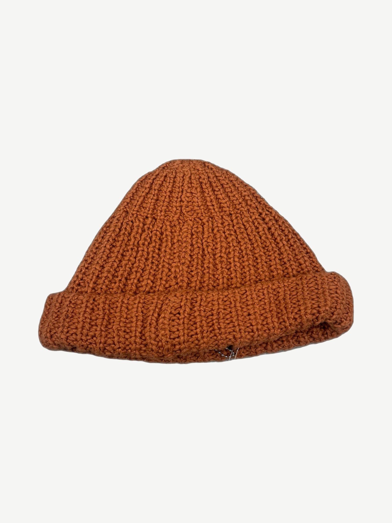 Paly Hollywood orange hand-knit logo beanie rear view showing thick ribbed knit texture and folded cuff.