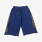 Happy Memories Don't Die navy long shorts back view with distressed varsity letter graphics down legs.