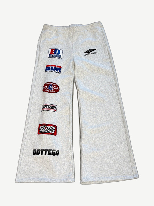 Bottega Desires heather gray flared sweatpants front view with stacked BD, BDR Bottega Racing patches down left leg.