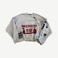 Enfants Riches Deprimes blue Oceanic crewneck sweatshirt with painted logo graphic across the chest.