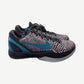 Nike Kobe 6 Protro ASG Hollywood 3D sneaker side view, snakeskin upper in red and gray with teal swoosh, icy outsole.