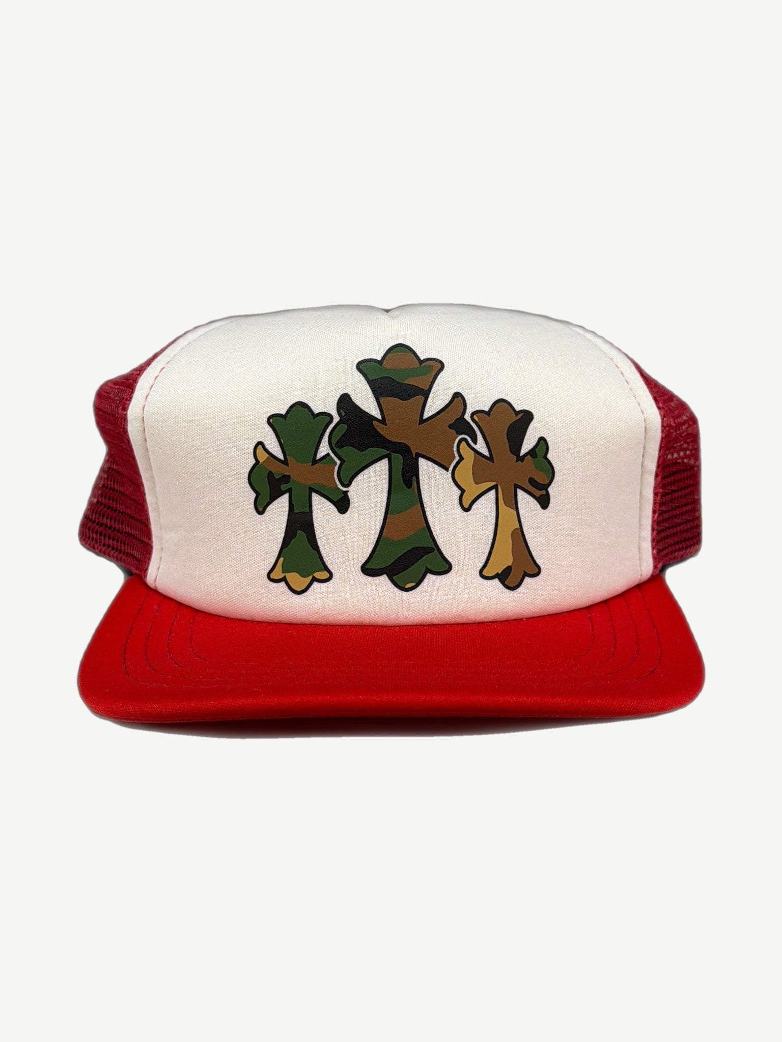 Chrome Hearts red mesh trucker hat front, white foam panel printed with three woodland camo crosses, red brim.