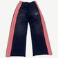 HMDD navy trackpants with red and white striped side panels, drawstring waist and embroidered Monster logo